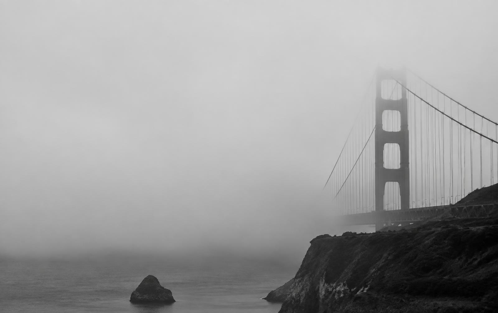 Golden Gate Bridge dissolving into San Francisco fog